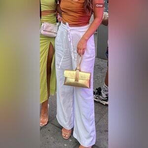 High waisted white slacks